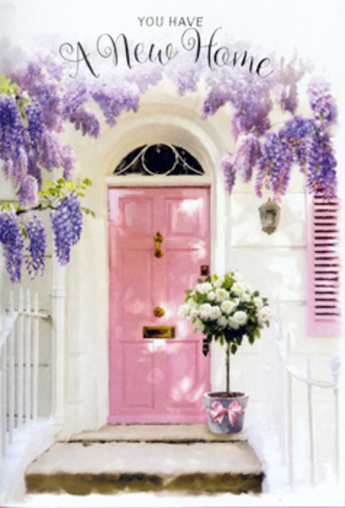 A tranquil Greenwich doorway is transformed into a floral vignette that feels both personal and poetic. The door itself is painted a chalky pink, the kind of understated colour you might spot on a tucked-away terrace near Cutty Sark, with soft brushstrokes visible in the finish. On one side, a pale pastel shutter echoes the same hue, tying the front of the home together with a gentle, cohesive charm. Spilling from above, wisteria cascades in long, dangling clusters of lavender and soft lilac, its blossoms dense yet airy, forming a natural canopy that embraces the entrance. The whitewashed wall behind it has a slightly uneven texture, catching the light and shadow from the trailing vines, which gives depth and a sense of age to the façade. At the foot of the door rests a florist's tin bucket in a smooth, dove-grey metal. Inside it, a generous arrangement of white and cream roses blooms in full abundance, the petals layered like fine fabric, each flower at peak freshness. Threads of leafy green foliage are tucked between the roses, providing a lush backdrop and subtle contrast. Around the bucket, a satin ribbon in a delicate pink is tied in a loose yet deliberate bow, a small but thoughtful flourish that softens the metal and connects visually to the colour of the door. The sunlight is mild rather than harsh, creating soft, painterly shadows that drift across the steps and threshold. Altogether, the scene feels like a quiet celebration of moving into a new home in Greenwich, the sort of welcoming floral gesture that marks the beginning of dinners with friends, weekend walks by the river, and everyday moments that slowly turn a new place into a sanctuary.